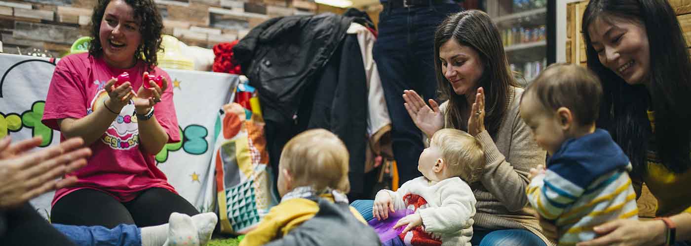 women-helping-children